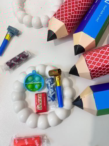 توزيعات بوكس قلم للاطفال