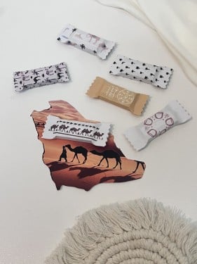 توزيعات ثيم مع شوكلاته او علك