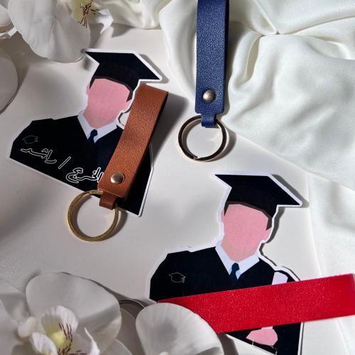 توزيعات ثيم التخرج مع تعليقه مفاتيح جلد