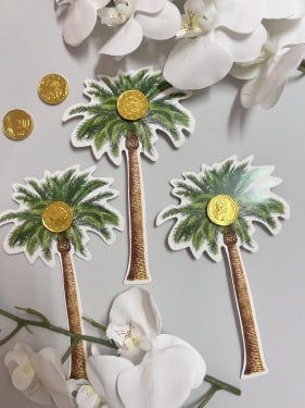 توزيعات ثيم نخلة مع شوكلاته ذهبية