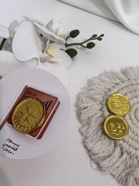 توزيعات يوم التاسيس مع شوكلاته ذهبية