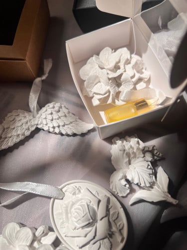 توزيعات تعليقه معطره مع زيت عطري