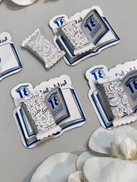 توزيعات ثيم  كتاب مع شوكلاته او علك