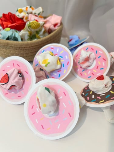 ثيم دونات مع ربطه شعر