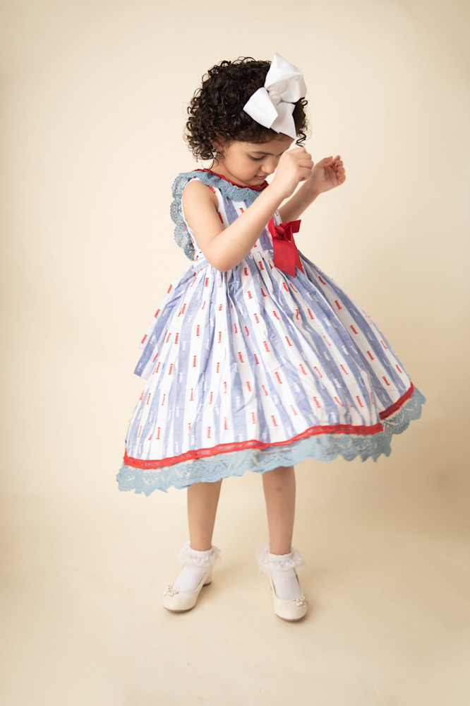 Girls dress with bow detail with a chest and bright colors with a belt at the waist Kholoud Kids Children s Clothing Store
