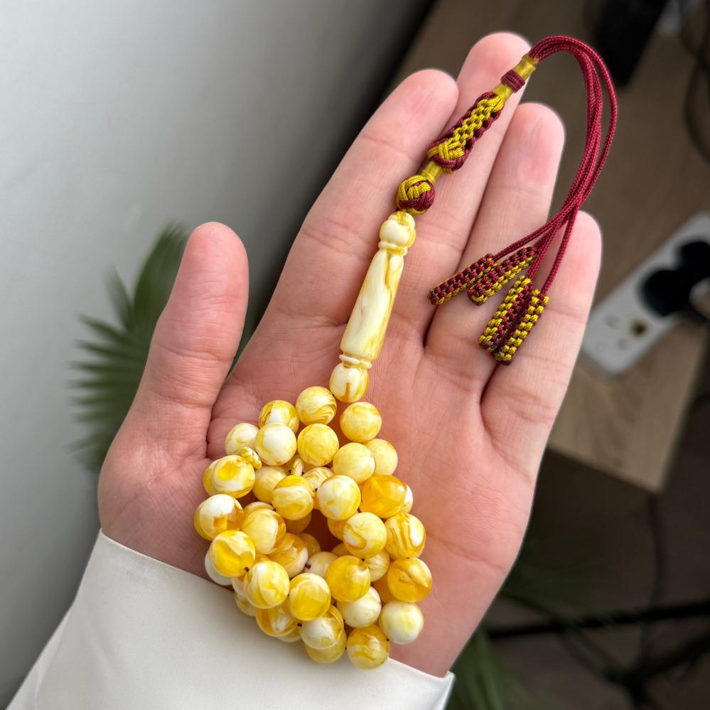 مسباح بكلايت شبيهه الكهرمان الملطخ (كركوشة)