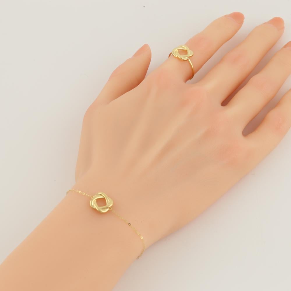 طقم ذهب بتصميم عقدة الحب الأنيقة - عيار 18