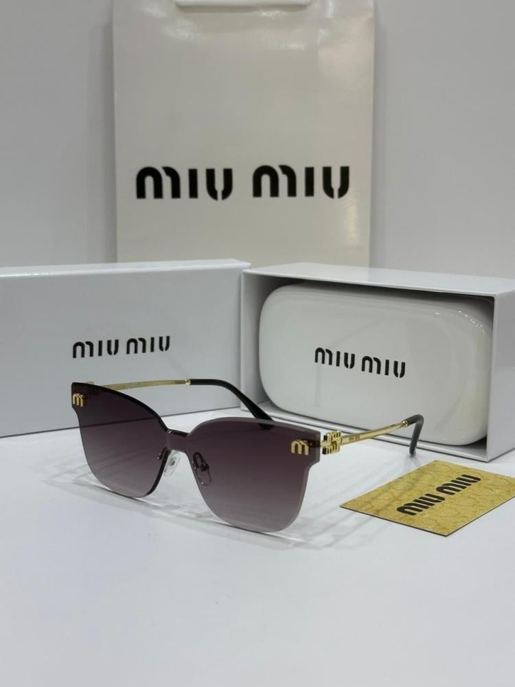 نظارات شمسية شكل عين القطه Miu Miu