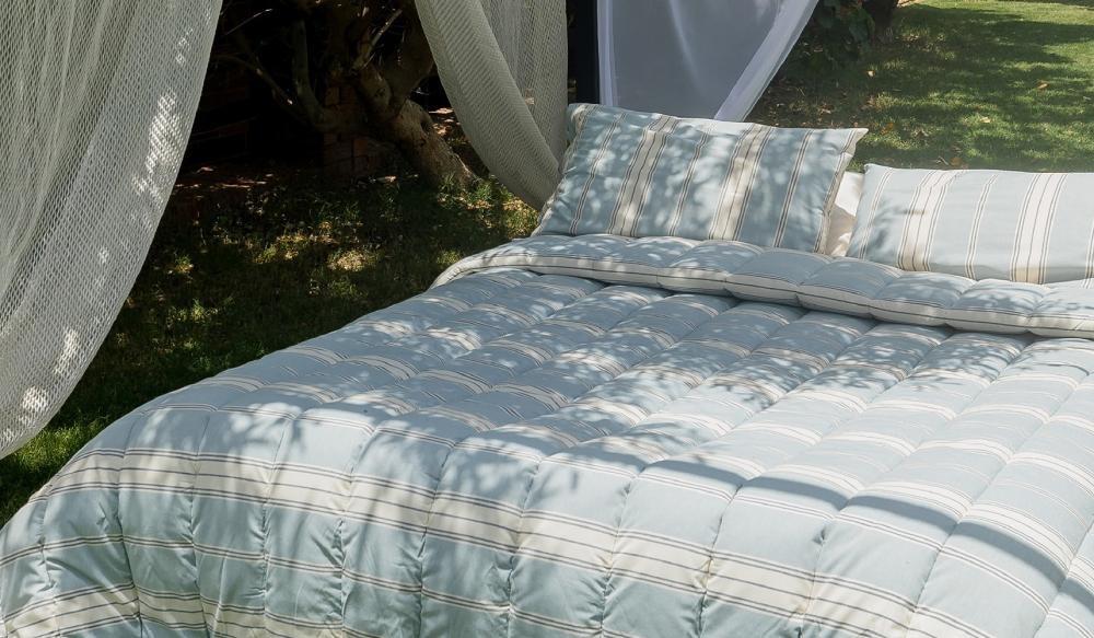 كيف تختار مفرش السرير المثالي لفصل الصيف؟ دليل عملي للطقس الحار