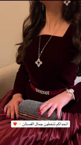 فستان عودي كسرات بلوسيه