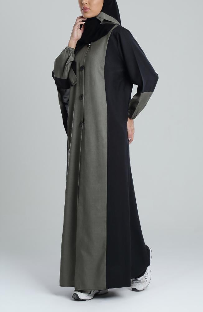 عباية بلونين أسود وزيتي بتصميم عملي ومريح