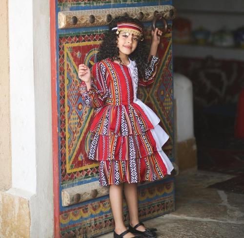 فستان سدو احمر بشعار يوم التاسيس