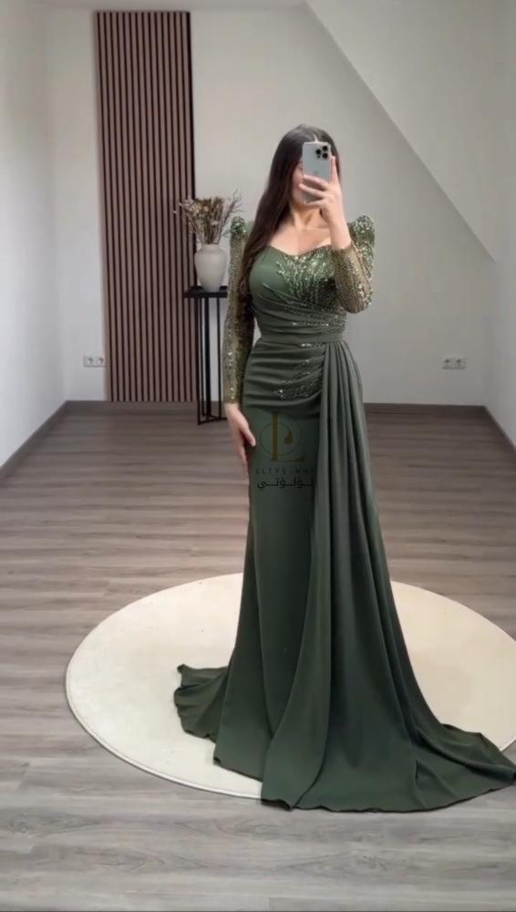 فستان سهره لون اسود والون زيتي راقي مطرز