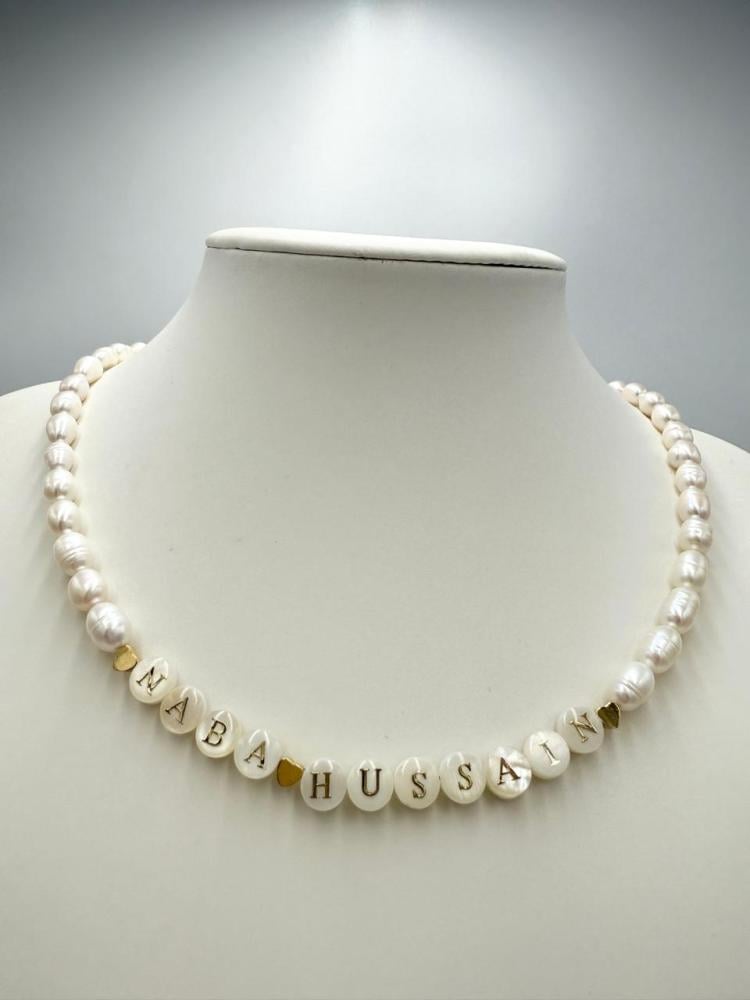 عقد لؤلؤ  المياه العذبه مع حروف لؤلؤ الصدف مرسومه بماء الذهب