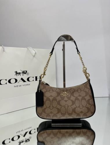 شنطه Coach تيري CE9