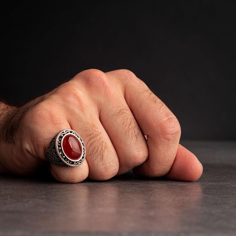 Men's silver ring with red agate stone and hollow decorations