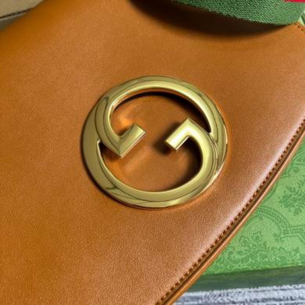 شنطة قوتشي بني