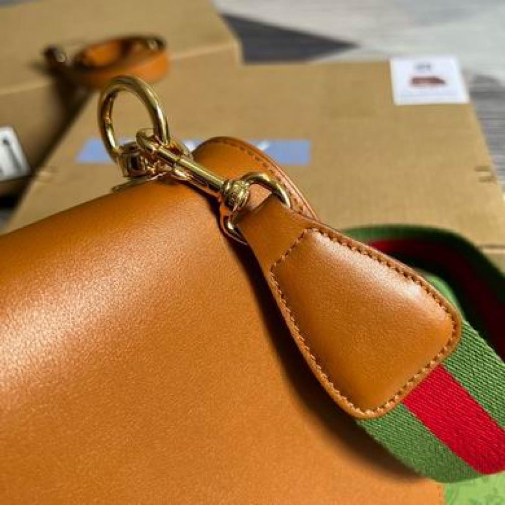 شنطة قوتشي بني