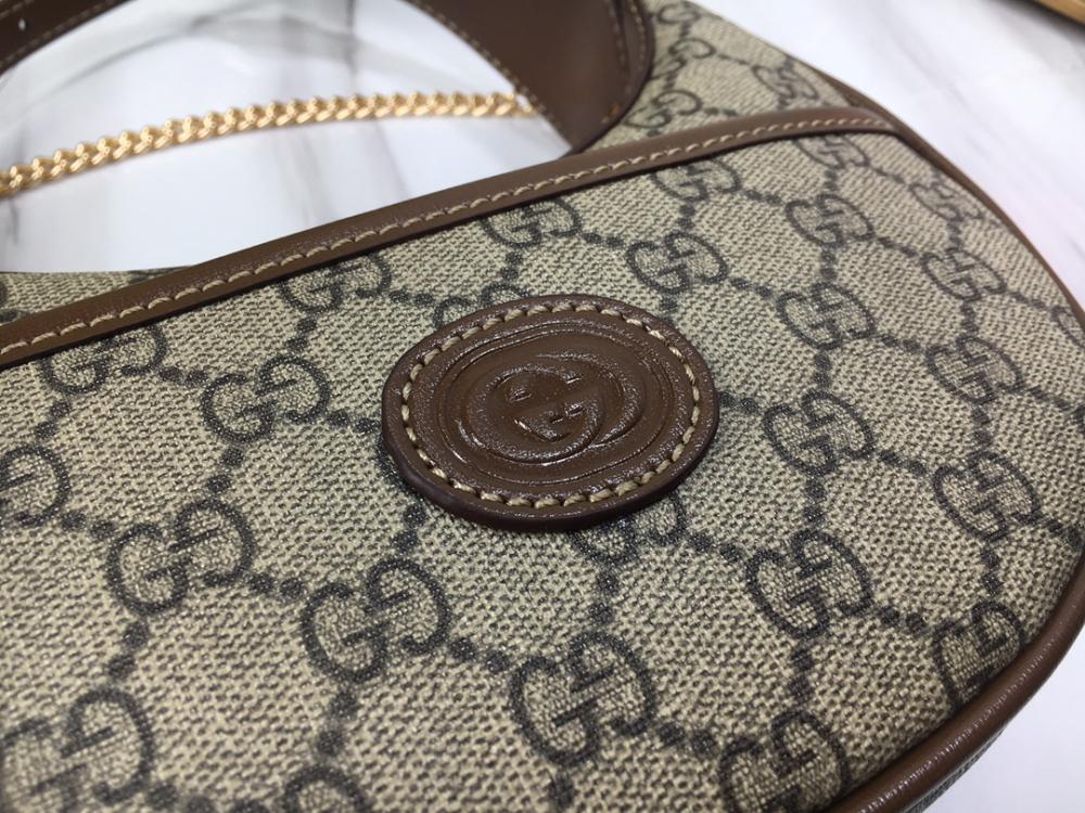 شنطة قوتشي بني