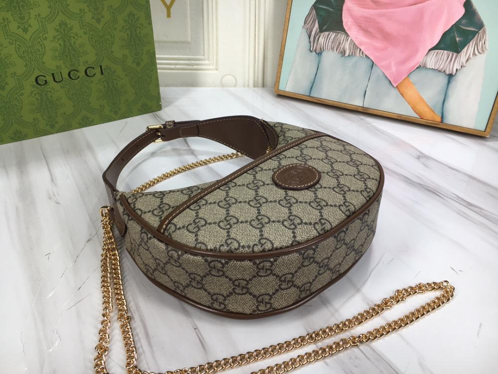 شنطة قوتشي بني