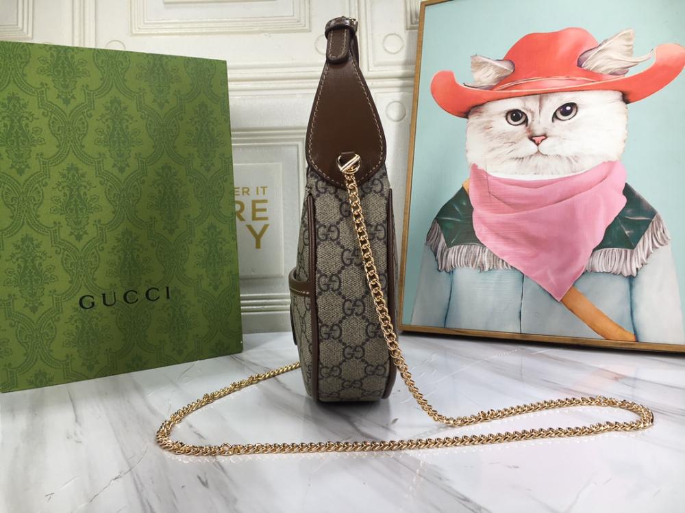 شنطة قوتشي بني