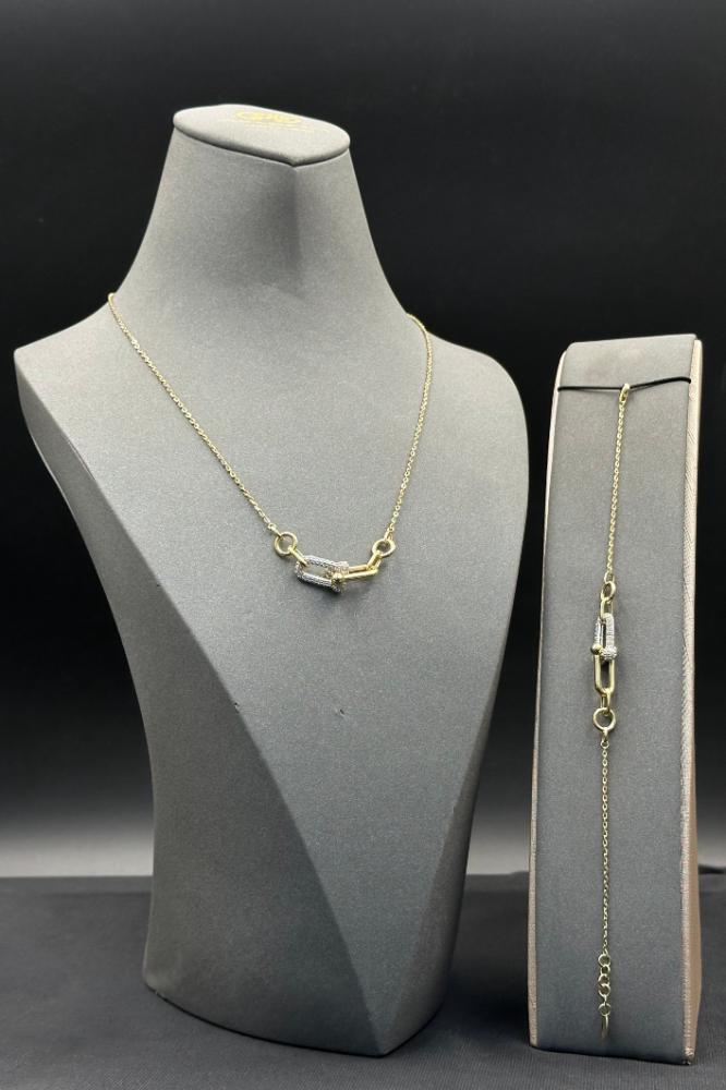 عقد مع اسوارة جنزير ذهب تصميم الماس عيار 18 وزن 10.8 جرام