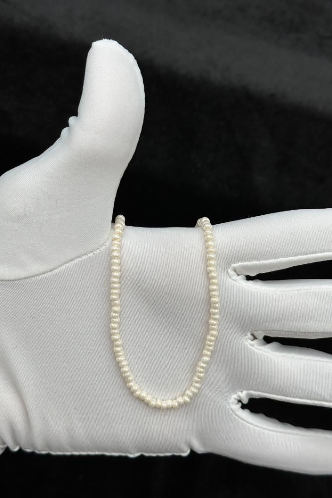 عقد لؤلؤ مع ذهب عيار 18 وزن من 0.18 الى 0.19 جرام