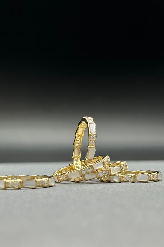 دبله صدف ابيض ذهب تصميم الماس