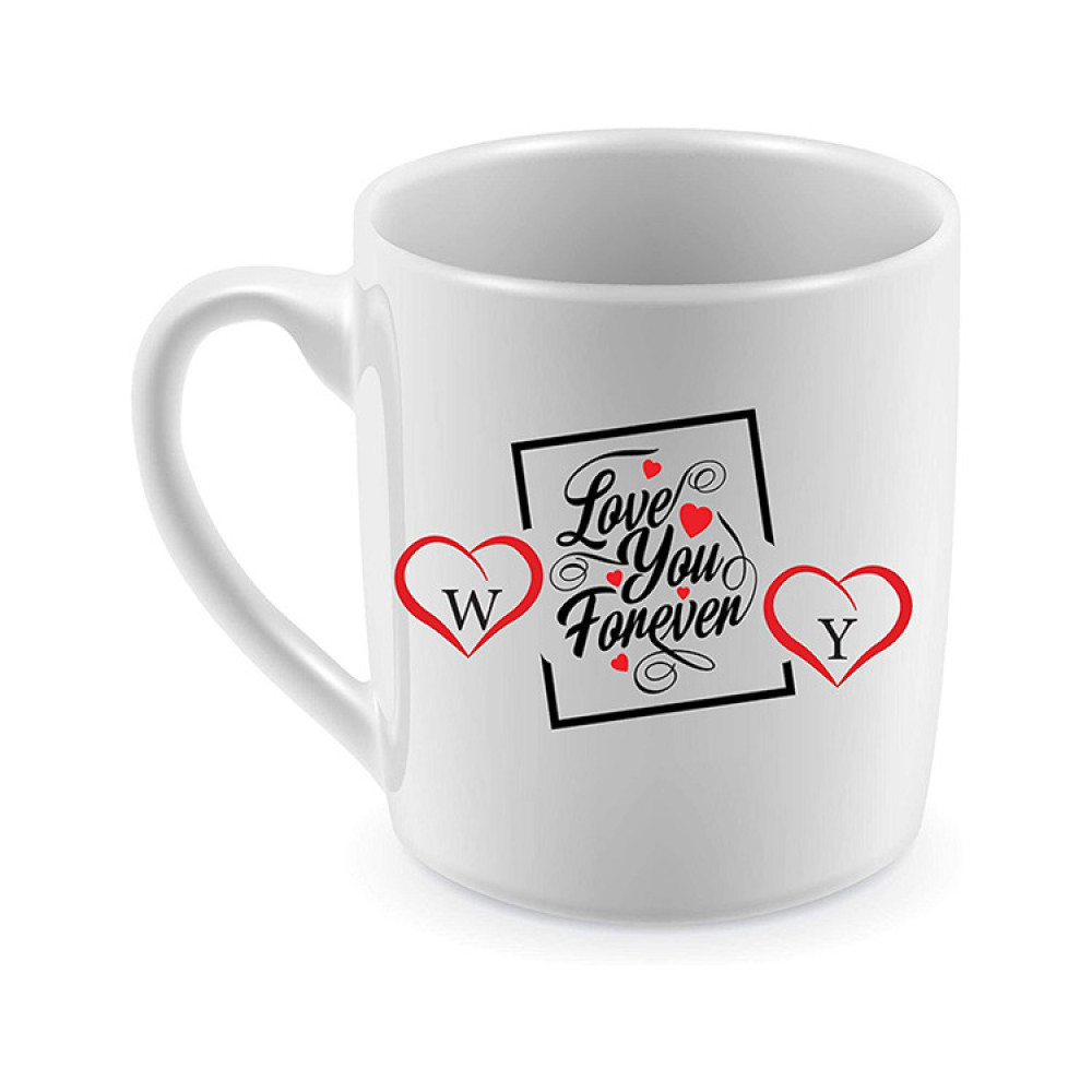 كوب للشاي مطبوع عليه بالوجهين بالإنجليزي حرفين W Y وبالعربي دمت في قلبي