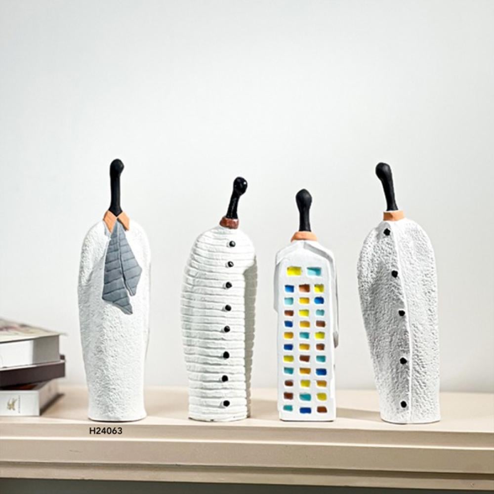 تحف فنية يدوية عبارة عن مجموعة مكونة من أربع قطع فريدة