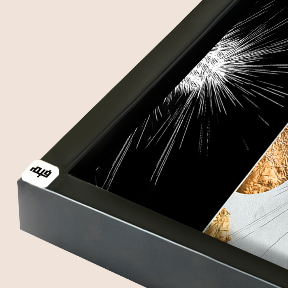 A black canvas wall painting with a golden semicircle