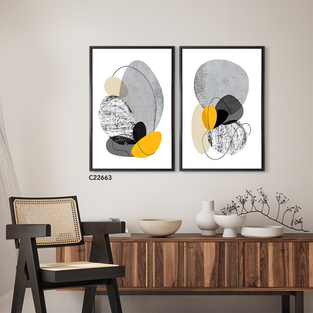 لوحة جدارية كانفس تصور اشكال دائرية متداخلة بتدرجات الرمادي والاصفر والاسود