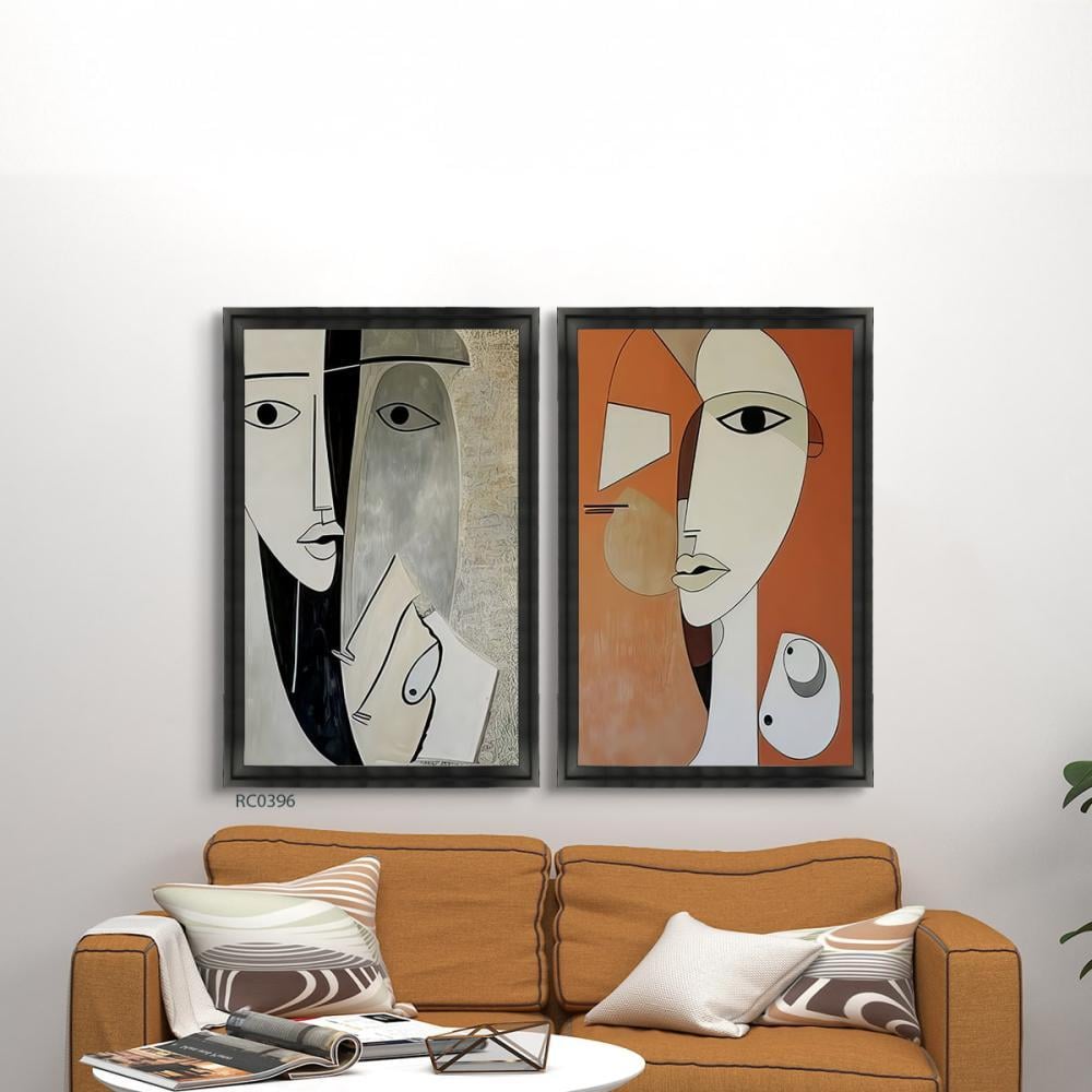 لوحة جدارية كانفس تصور وجوه تدرجات البرتقالي مع  الرمادي والاسود