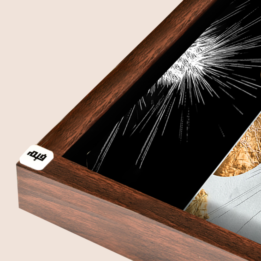 A black canvas wall painting with a golden semicircle