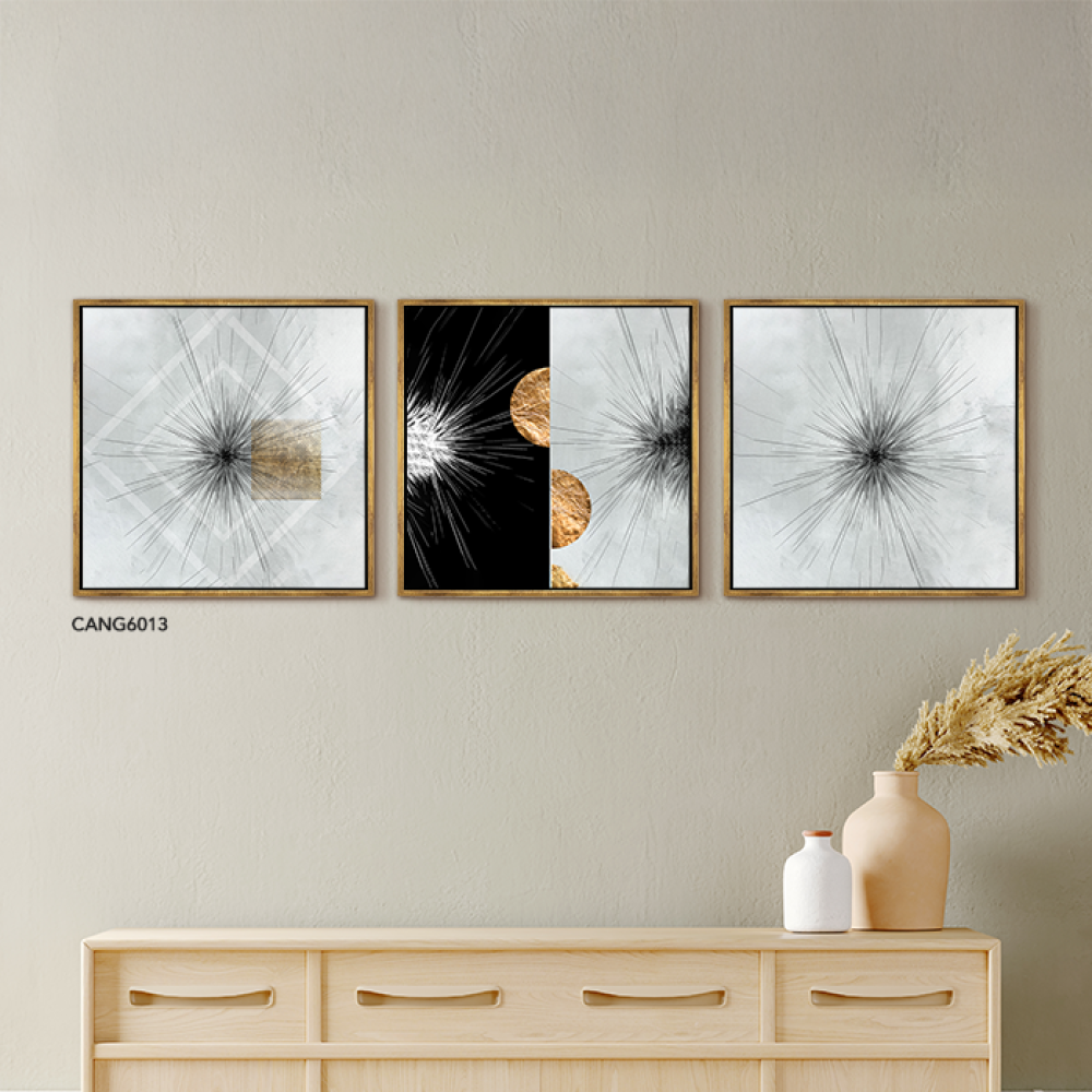 A black canvas wall painting with a golden semicircle