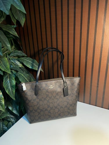 شنطه كوتش بني