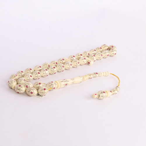 عاج بالذهب والياقوت