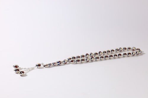 سبحة قفص 33 حبة بيضاوي مع عاج  ولابس