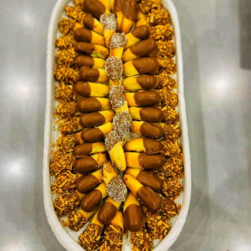 معمول تمر اصابع مغطس بشكولاتة