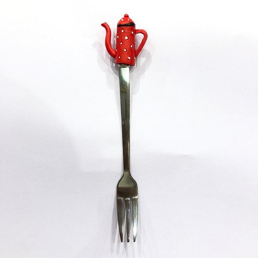 شوكه معدنية عليها قوري ديكور | Decorative metal fork |