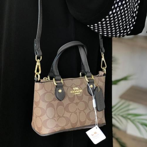 شنطة coach
