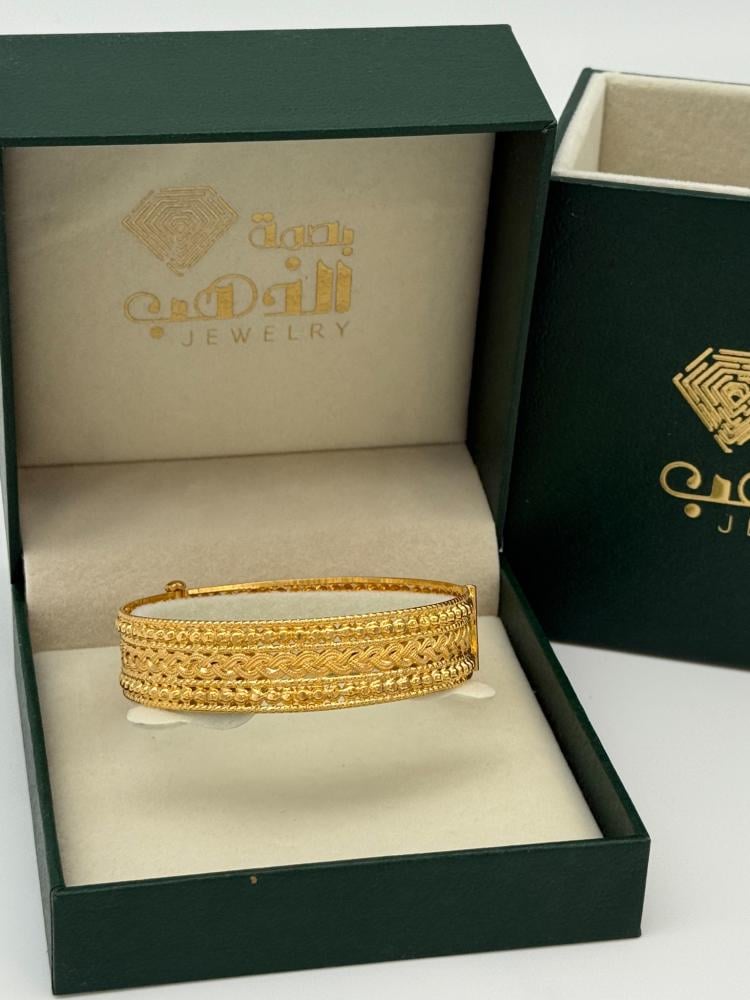 سوارة تصميم المجدولة ذهب عيار 21