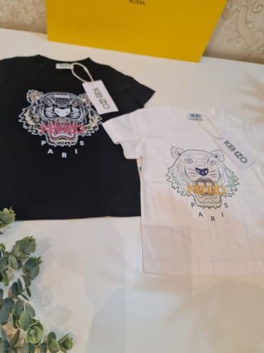 بلوزة أنيقة اللون ابيض