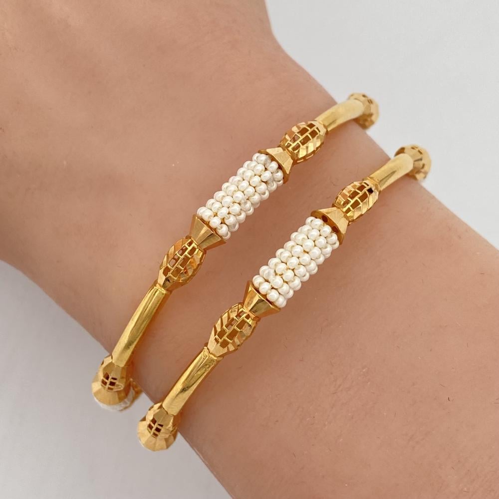 غويشة ذهب سعودي عيار 21 محلاه باللؤلؤ الأبيض لإطلالة كلاسيكية راقية وزن 9.34 جم