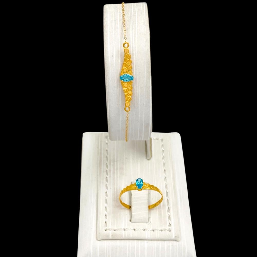 طقم جناح الصقر ذهب عيار 21 الوزن 3.78 جرام بفص تركواز