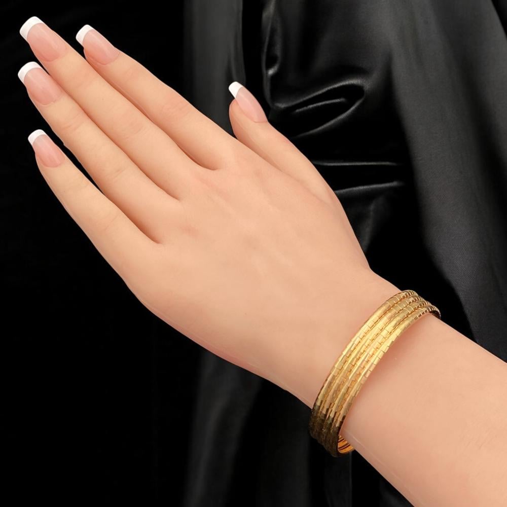 غويشه كوبرا ذهب عيار 21 بتصميم أنيق يعكس الفخامة وزن 7.5 جم تناسب كافة مناسباتك