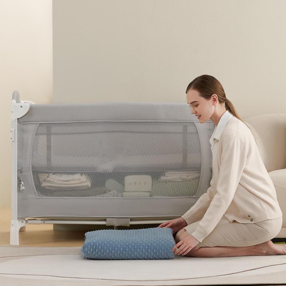 سرير ومحبس متنقل مع طاولة تغيير