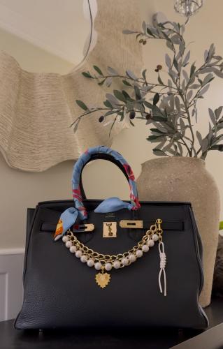 تعليقة للشنطة