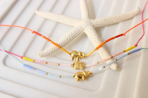 خلخال فيل ذهبي خرز ملون