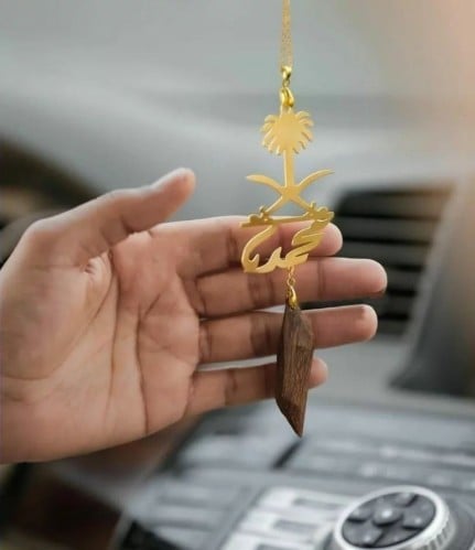تعليقه السيفين والتخلة بالاسم حسب الطلب